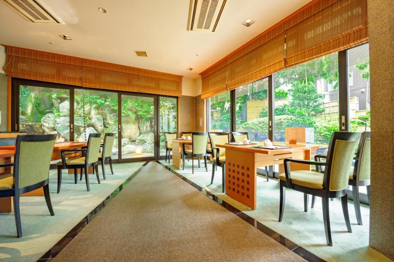 Kanazawa Hakuchoro Hotel Sanraku -Natural Hot Spring- Esterno foto Interior of a restaurant in Tokyo